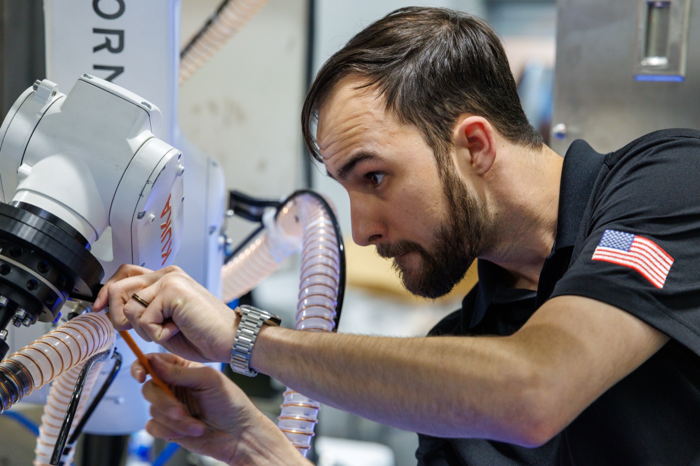 Formic field service engineer working on a robotic cell, the included service that keeps every system running