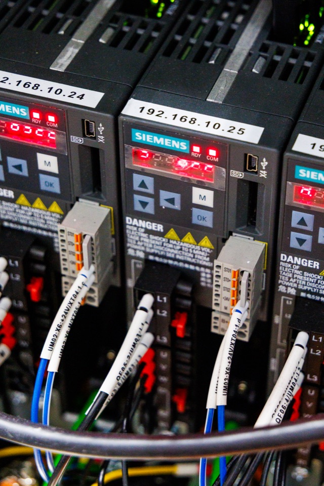 Siemens servo drives in a Formic control cabinet, Core executes Cortex's decisions in deterministic, safety-rated motion