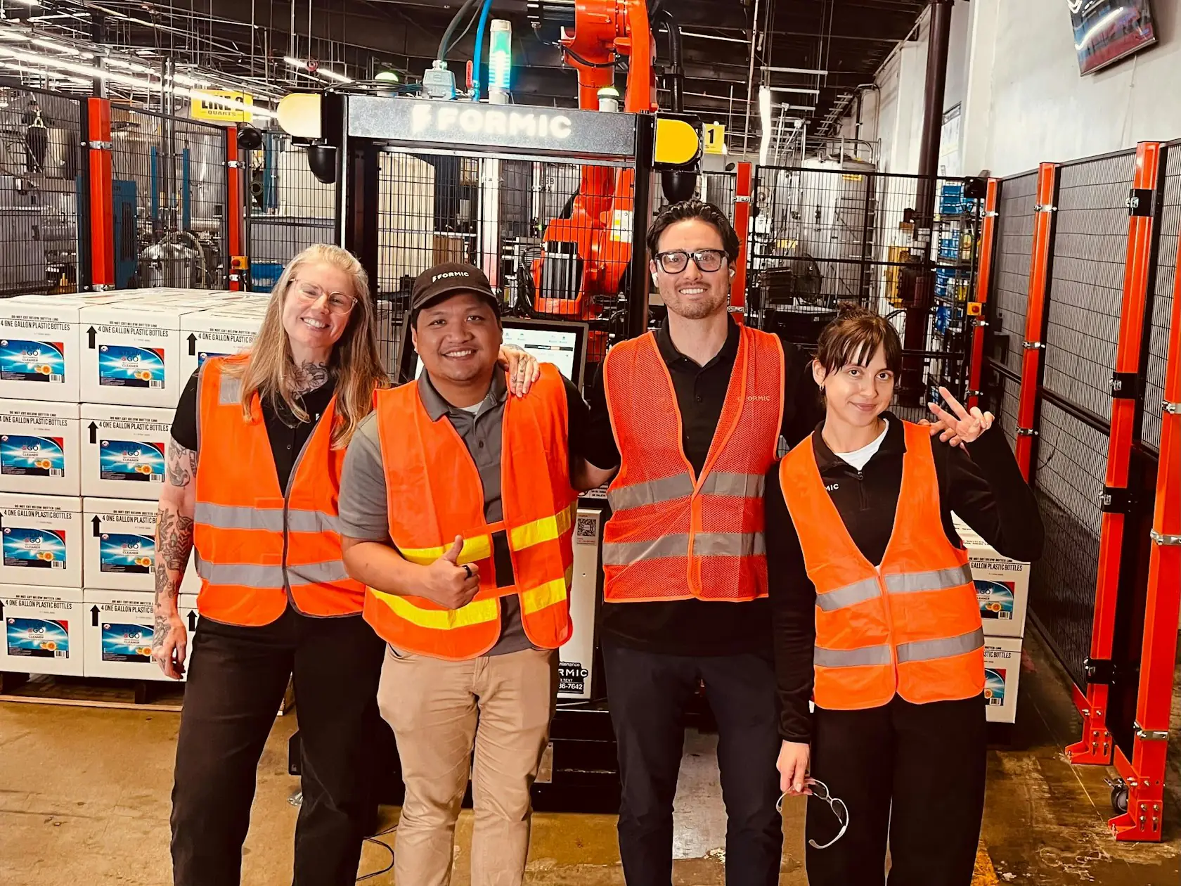 Team Formic on-site — the crew in front of a Formic robotic cell